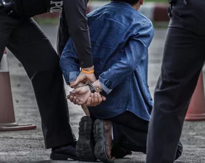 man handcuffed by police 