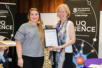 Kirsten Slemint receiving award from Professor Melissa Brown