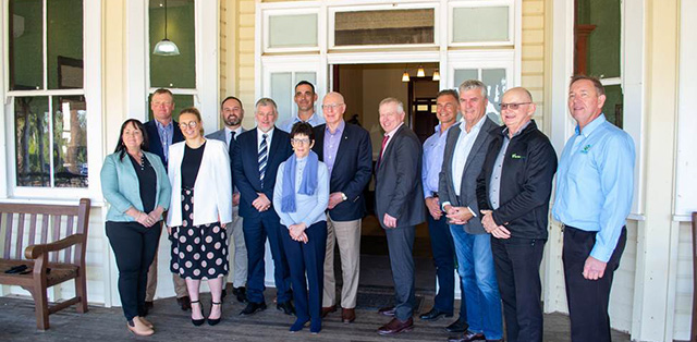 Group photo in front of Foundation Building entrance