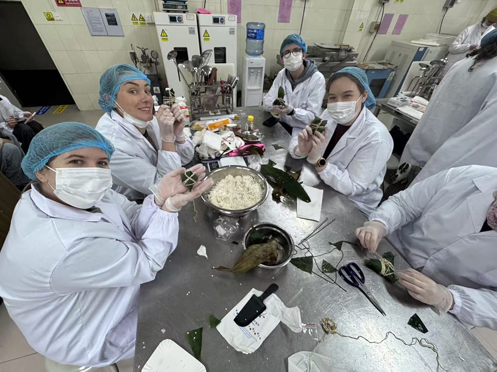 students making food in China