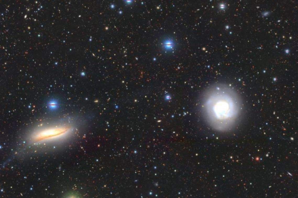 A high-resolution colour image showing the central galaxies NGC5713 and NGC5719 taken by the Hyper Suprime-Cam at the Subaru telescope in Hawaii.