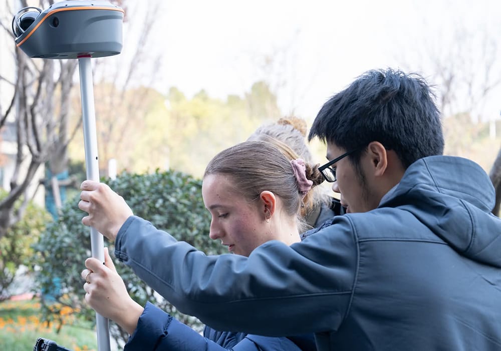 students using geospatial equipment
