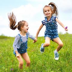 Girls jumping in nature