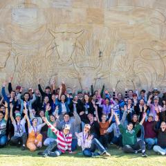 The whole group poses for a photo