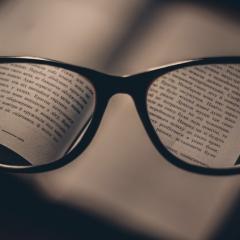 Glasses on book
