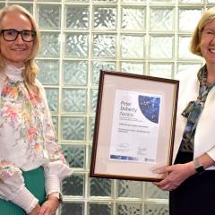 Melissa Brown accepts the Peter Doherty Award for Excellence in STEM Education