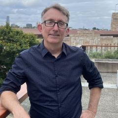 Associate Professor Nigel Beebe poses for a photo